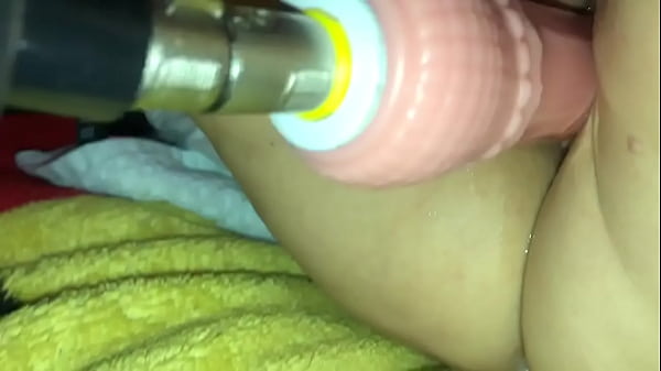 Milf fucking a machine