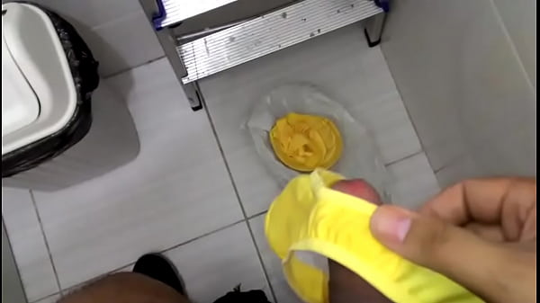 Playing with the whore’s panties in the bathroom at work